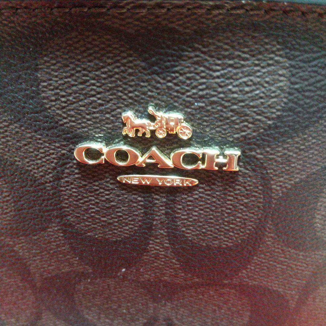 COACH ロゴ入りブラウンレザーボディバッグ