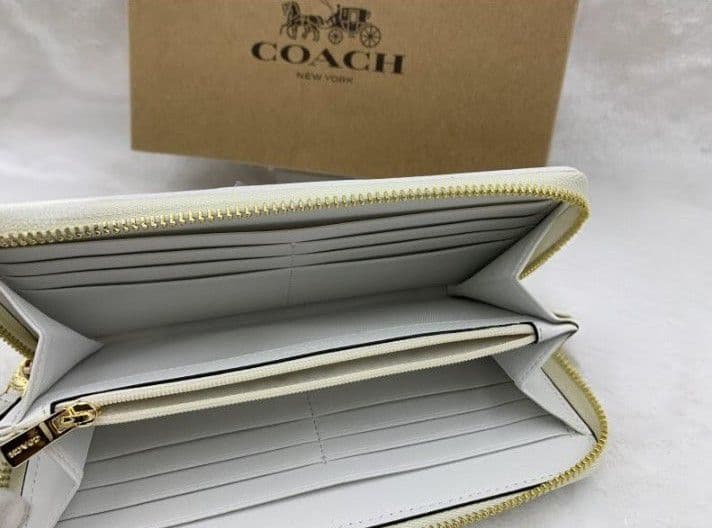 新品未使用コーチ長財布ベージュシグネチャーレディースメンズ送料無料即日発送