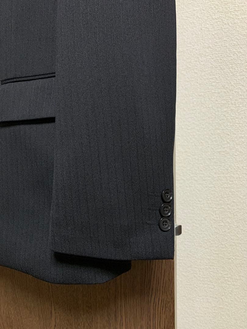 A6新品未使用！着心地抜群ストレッチビジネススーツ！ウォッシャブル無地調ブラック