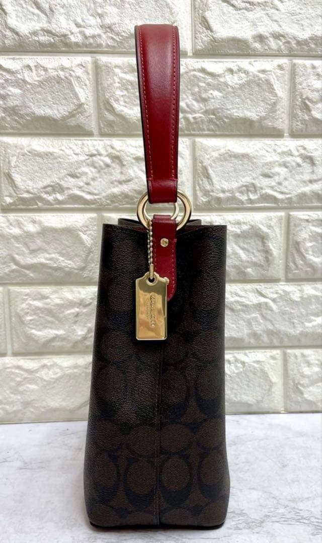 コーチ　シグネチャー　スモールタウンバケットバッグ