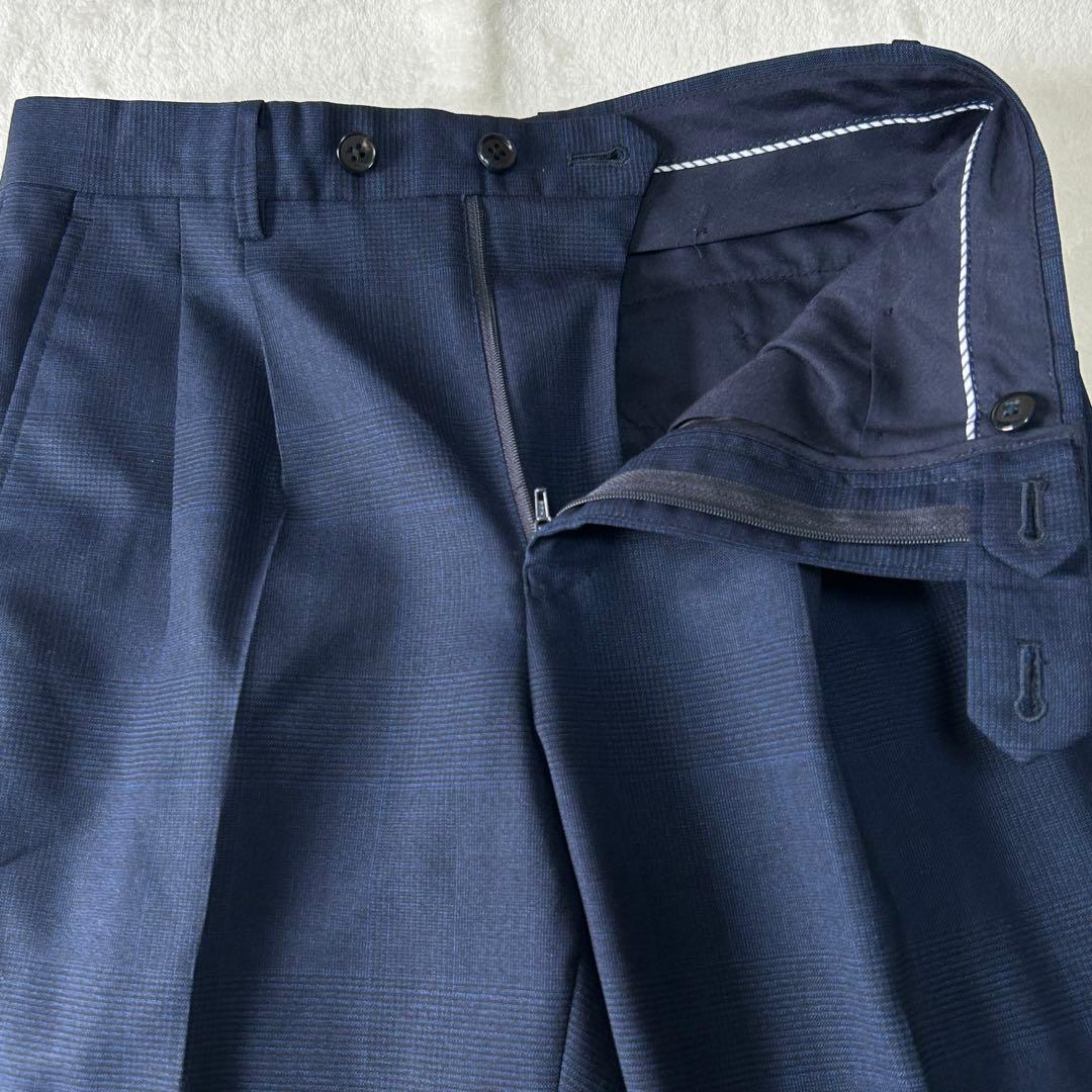 美品 ユニバーサルランゲージ カノニコ スーパーソニック ダブルスーツ M 紺