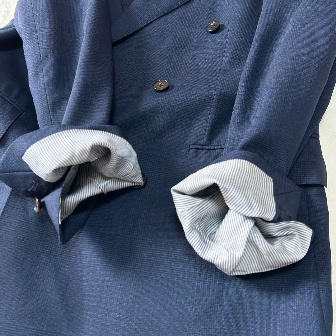 美品 ユニバーサルランゲージ カノニコ スーパーソニック ダブルスーツ M 紺