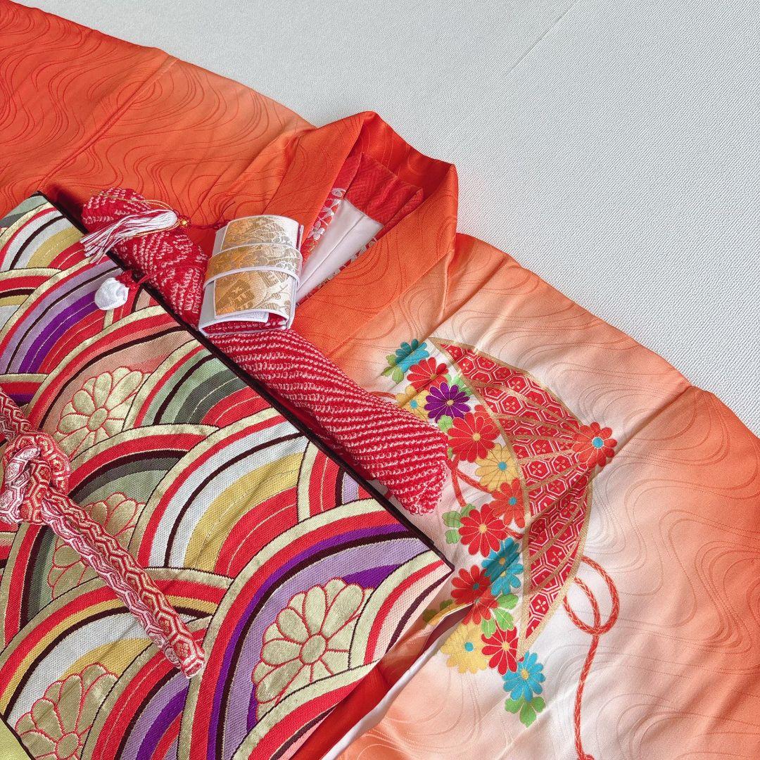 フルセット七五三７歳女の子　オレンジ地　傘椿　黒地袋帯　袖なし長襦袢7125