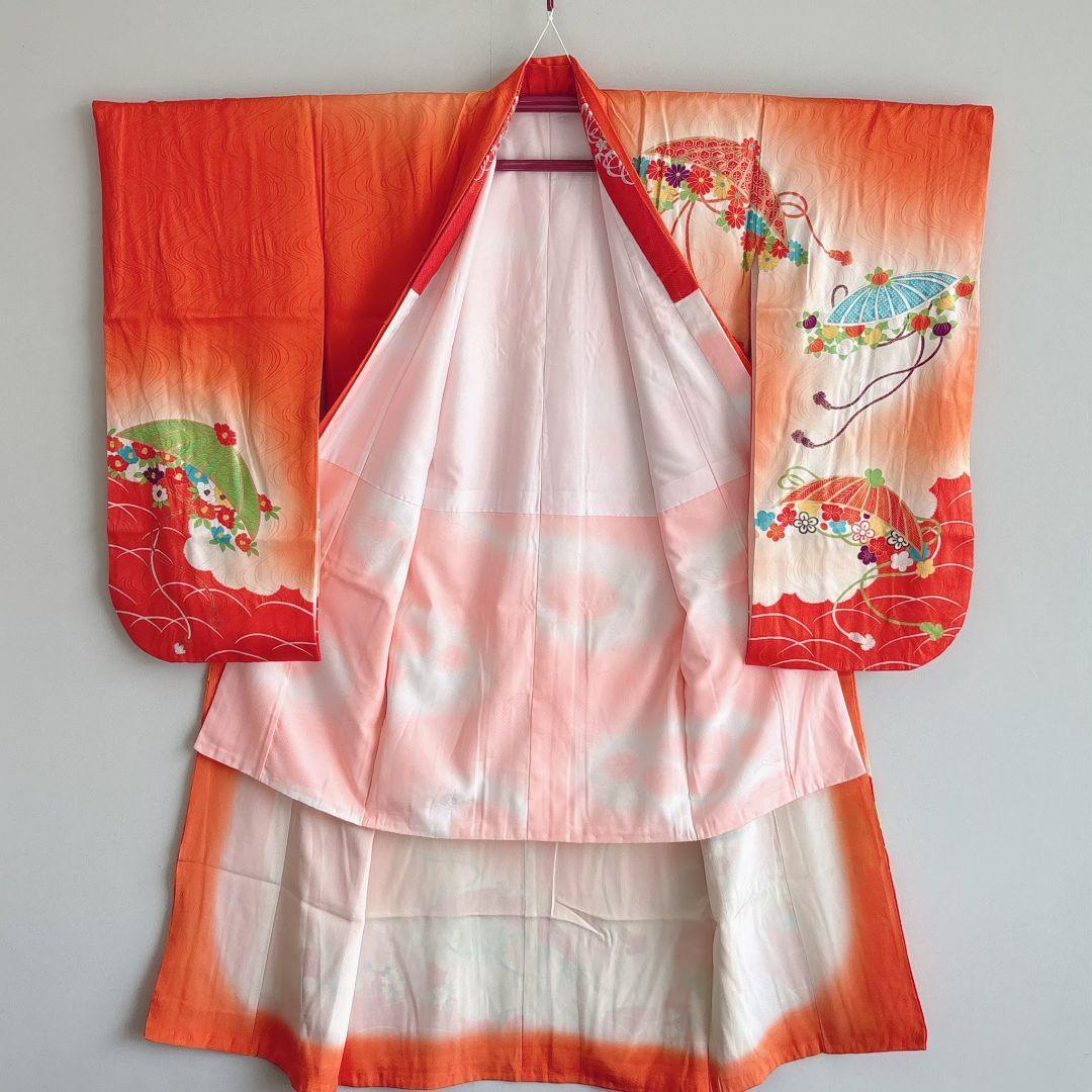 フルセット七五三７歳女の子　オレンジ地　傘椿　黒地袋帯　袖なし長襦袢7125