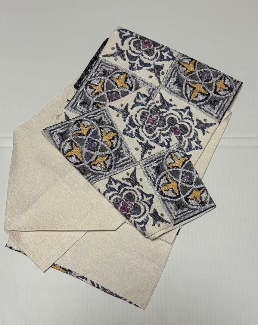 帯屋捨松　白の紬幾何学模様　八寸帯　単にも！