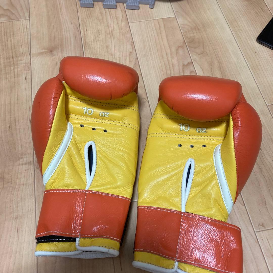 Winning ボクシンググローブ 10 oz オレンジ/イエロー