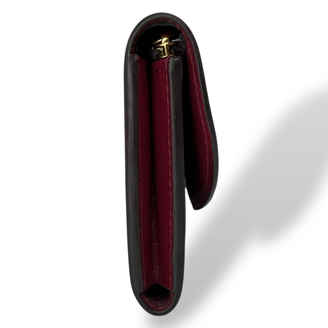 ルイヴィトン　ケース　ポルトモネロザリ　フューシャ　モノグラム　ブラウン