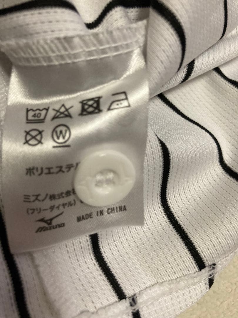 阪神佐藤輝明チャンピオンエンブレム付きレプリカユニフォームMサイズ