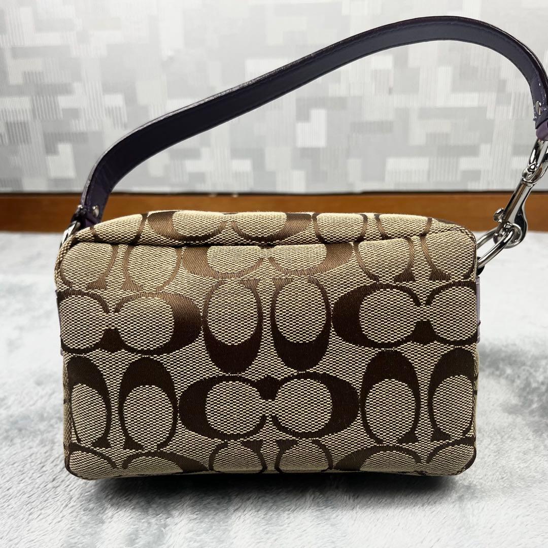 極美品 COACH コーチ アクセサリーポーチ ターンロック レガシー パープル
