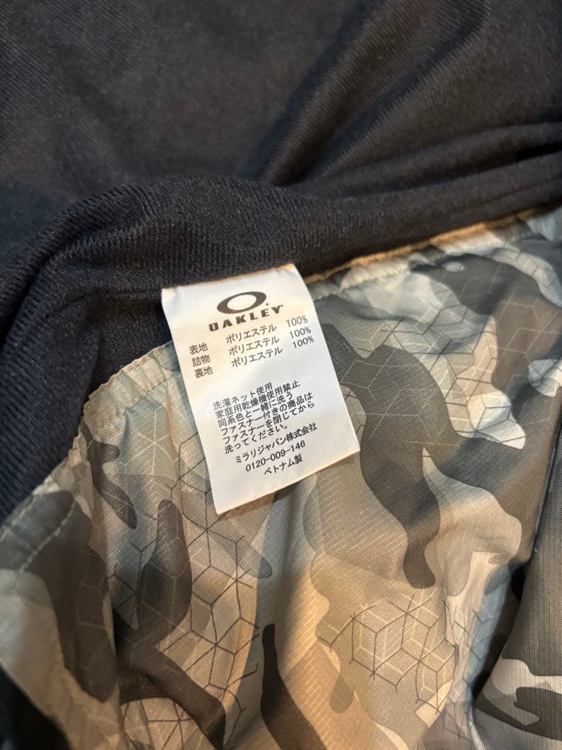 美品　oakleyオークリー　ロング　ベンチコート　防寒　黒/迷彩　人気