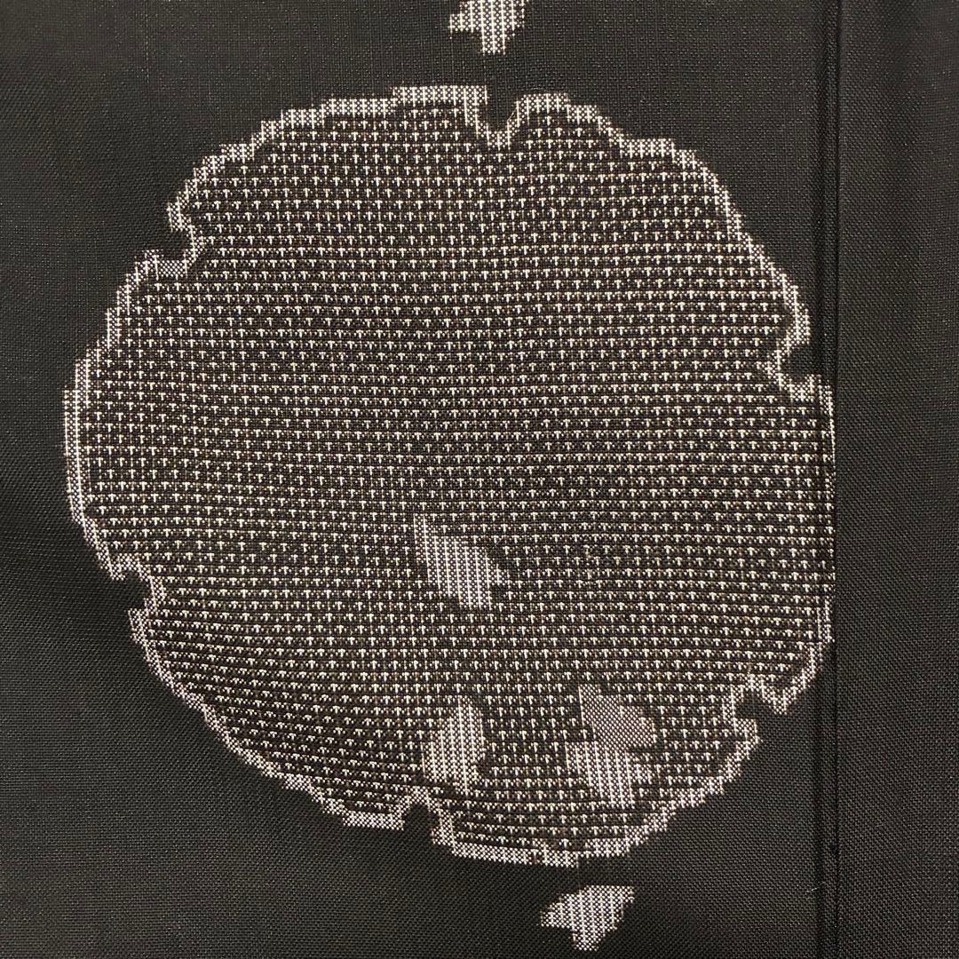 D81 本場大島紬 泥染め 雪輪 証紙付き 正絹 着物 袷 極美品