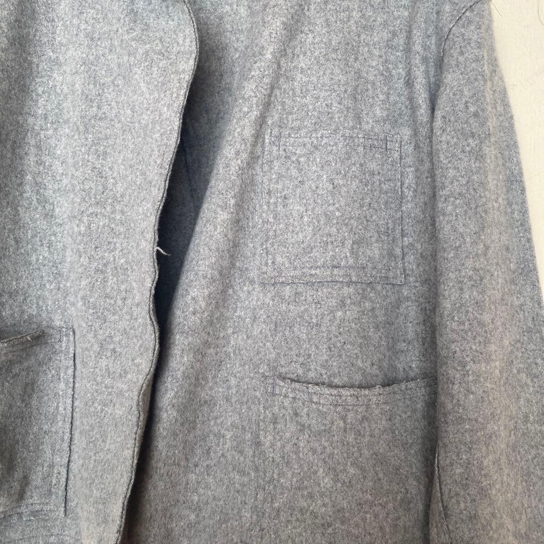 イオグラフィック　a.切りっぱなしウールジャケット　グレー