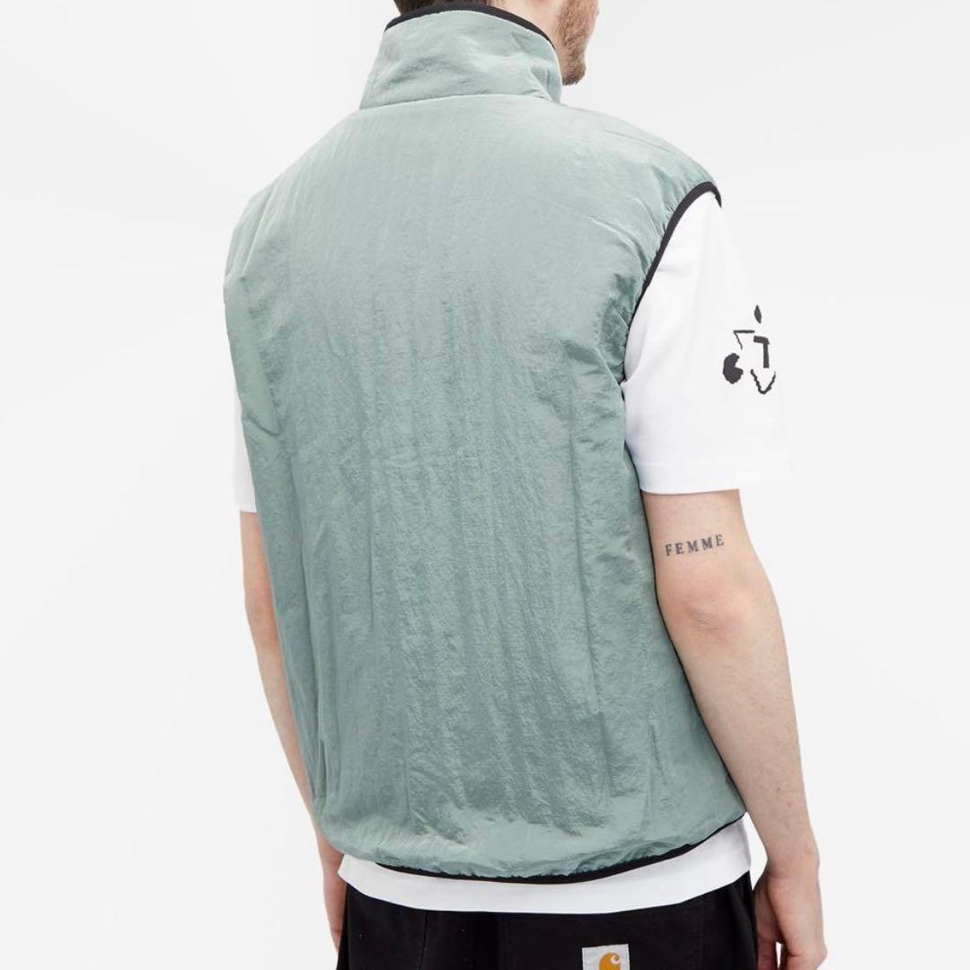 THE TRILOGY TAPES リバーシブル ボアフリースベスト 黒 緑