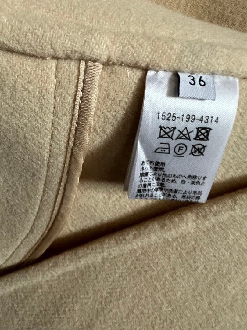 クリーム色 ノーカラージャケット