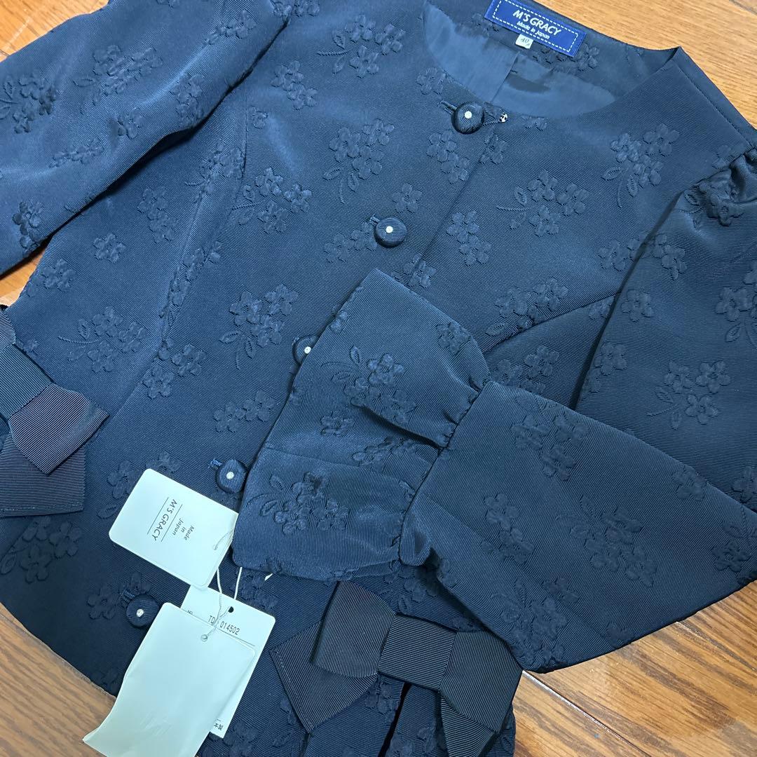 新品・未使用　M'S GRACY ネイビー ノーカラージャケット 40 リボン