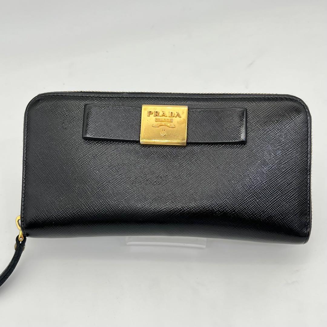PRADA 長財布 ラウンドファスナー ロゴ金具 リボン サフィアーノレザー 黒