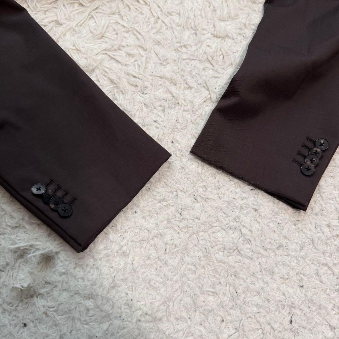 近年極美品XLサイズ相当　ユニバーサルランゲージ　sustaina スーツ