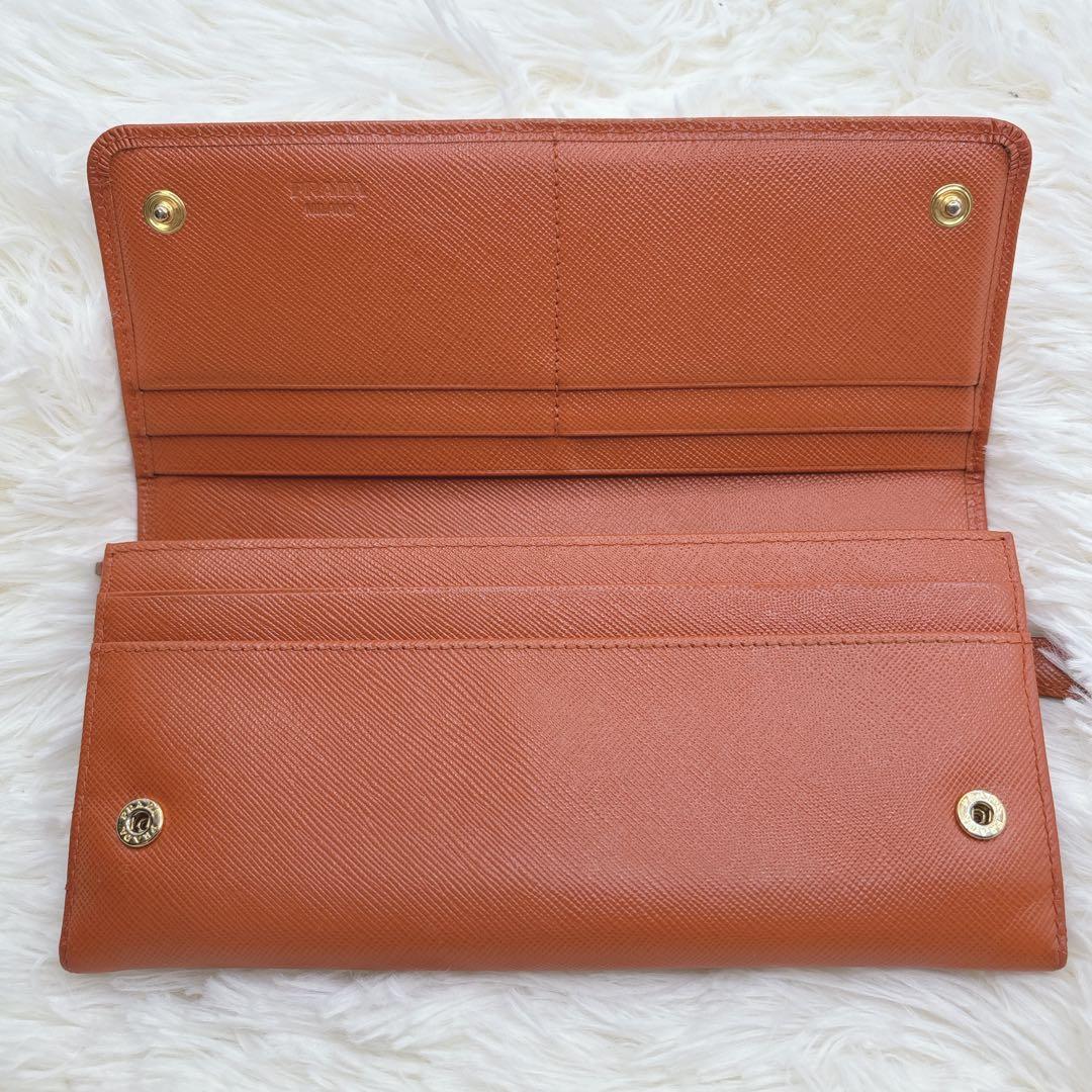 プラダ 長財布 サフィアーノ フィオッコ レッド メタルロゴ リボン