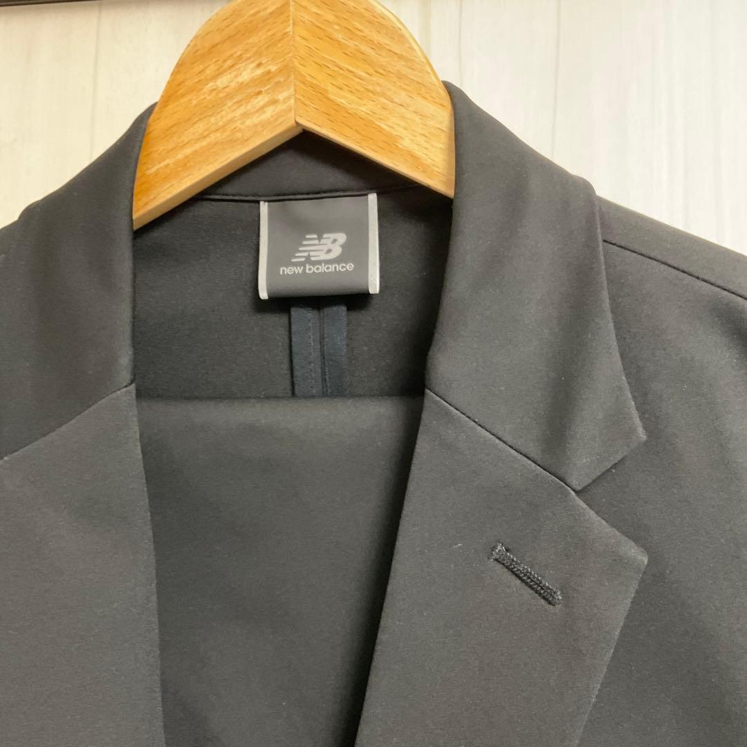 new balance ブラックスーツ　used 上下XLサイズ