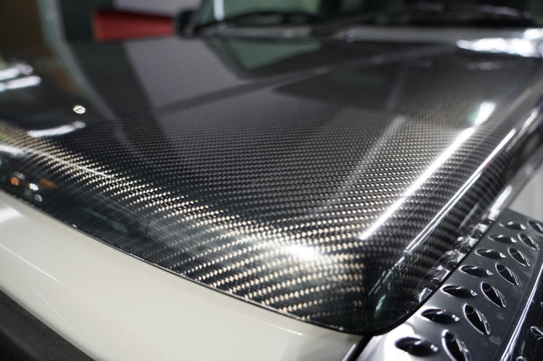 たにけんジムニーブラックカーボンボンネット　JB64　クリアー塗装品