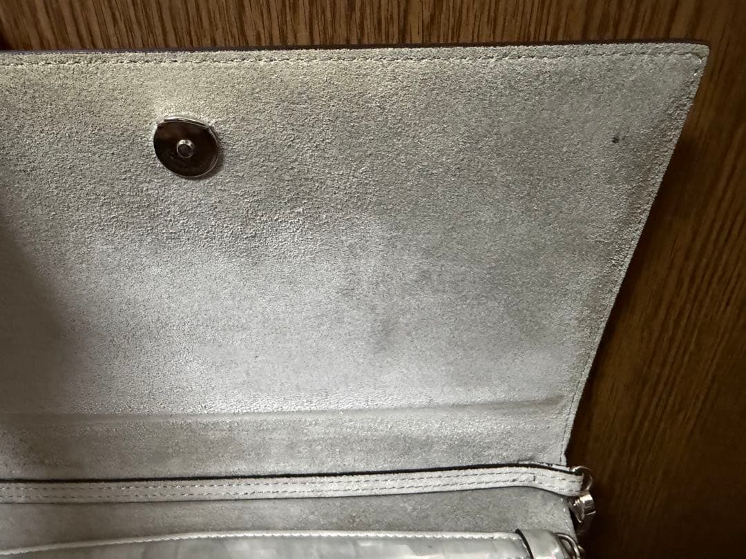 Christian Louboutin スタッズ付きシルバークラッチバッグ