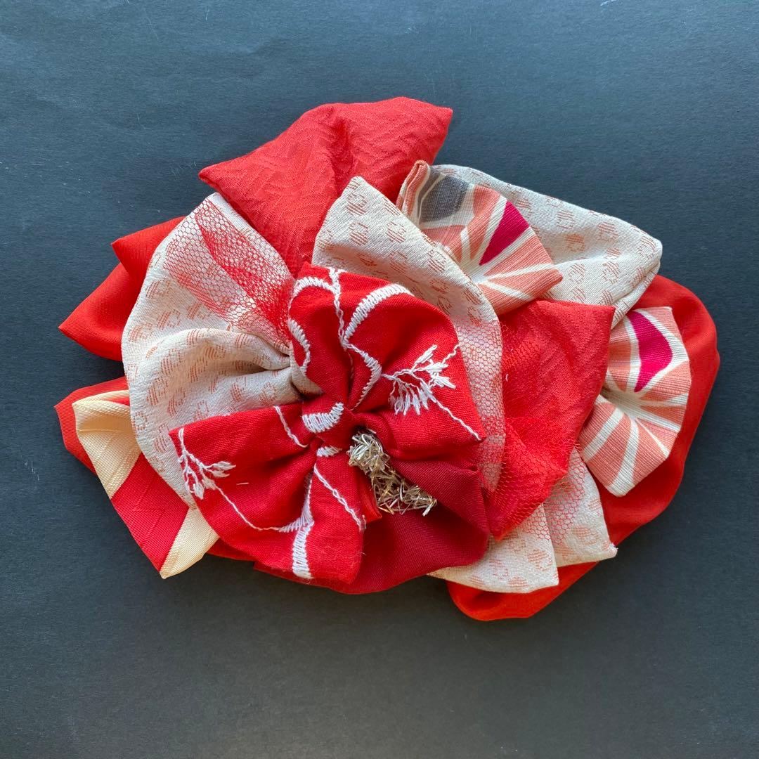 m.y 大きな赤いリボンのヘアアクセサリー とピンクの髪飾り