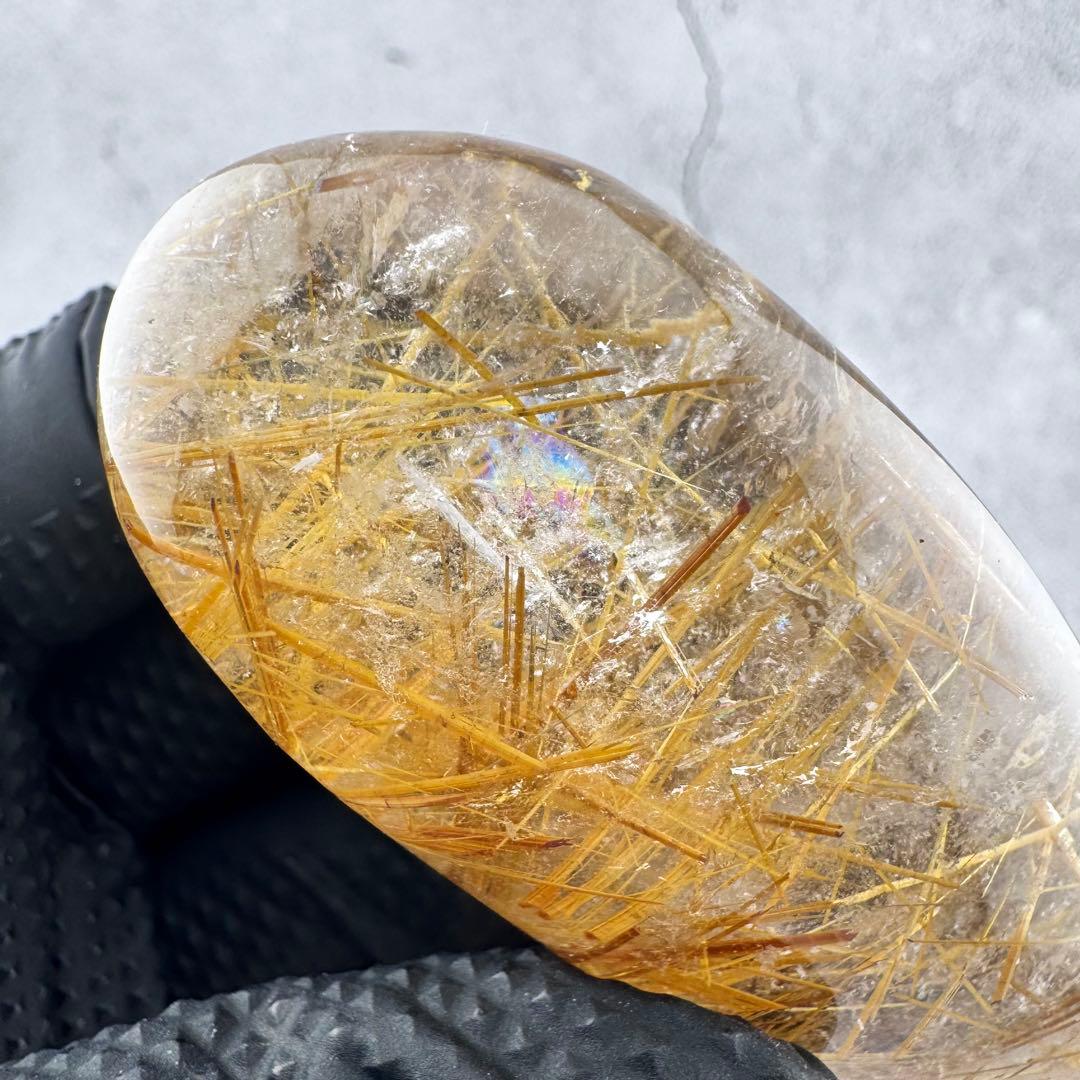 G-178タイチンルチル研磨石　ゴールドルチル放射状原石　天然石119g