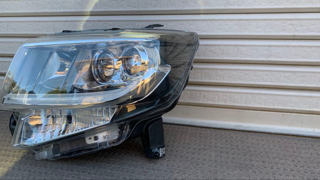 タントカスタム　左ヘッドライト　LA600S