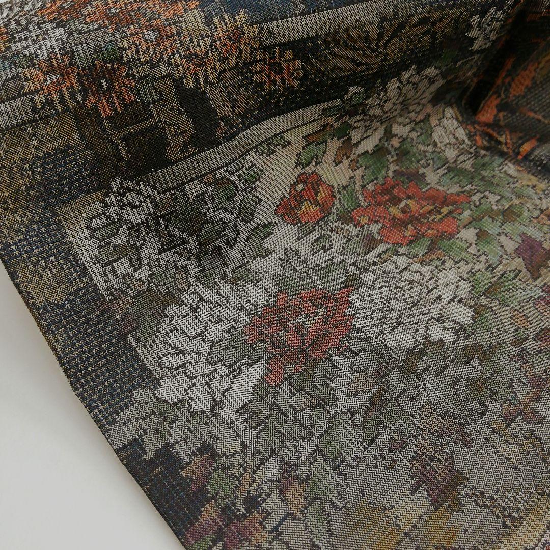 本場大島紬(袷)　(四季の草花紋様　恵 積五郎(絣の魔術師)　裄68㌢身幅広め)