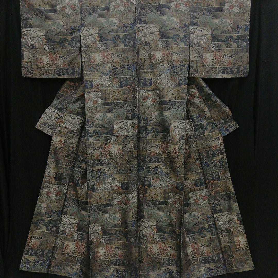 本場大島紬(袷)　(四季の草花紋様　恵 積五郎(絣の魔術師)　裄68㌢身幅広め)