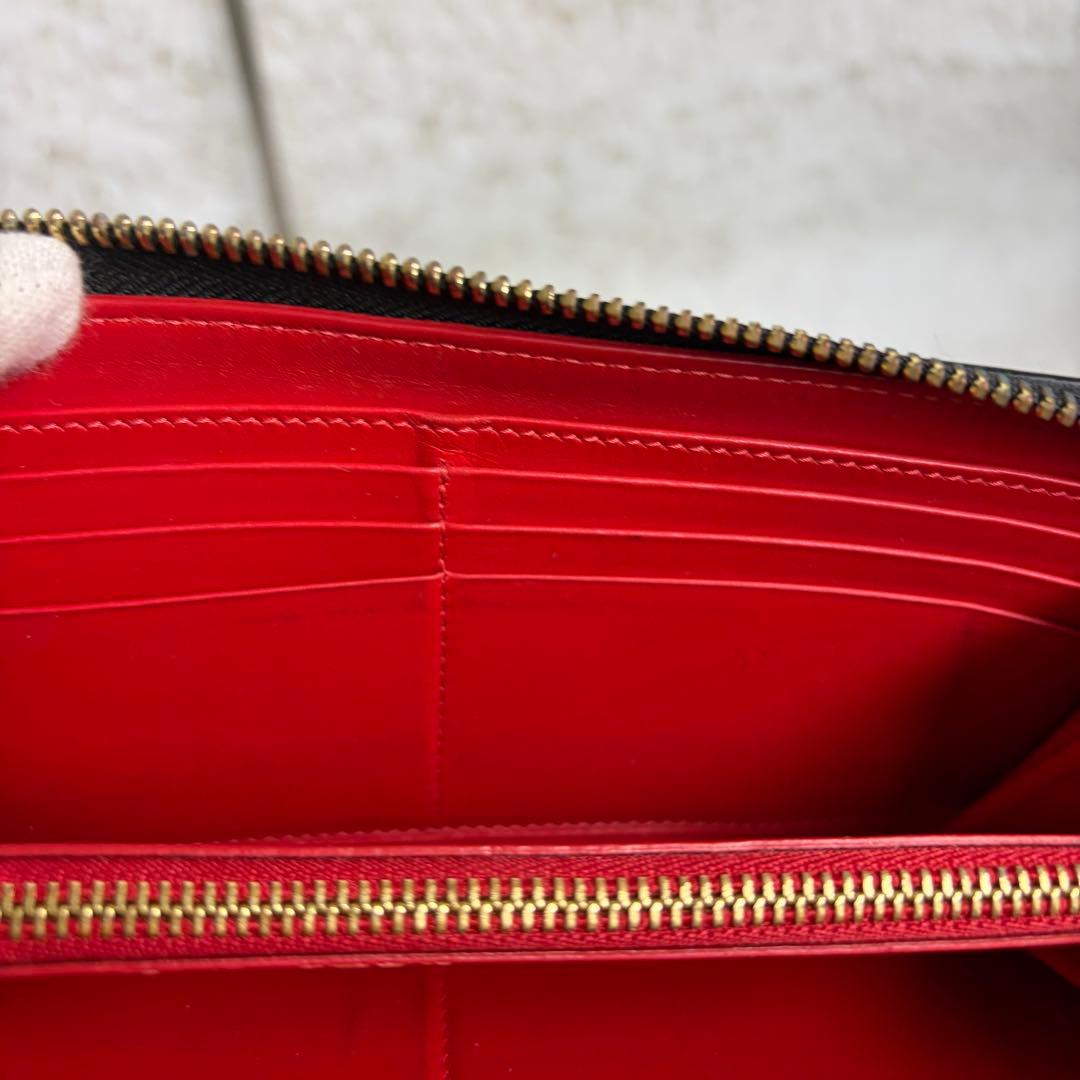 クリスチャンルブタンパネトーネ グラデーションスタッズ ラウンドジップ長財布