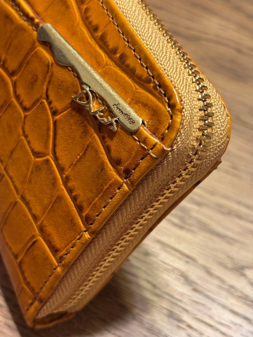 新品 未使用 ダコタ 長財布 ラウンドファスナー オスピタリタ マスタード 黄色