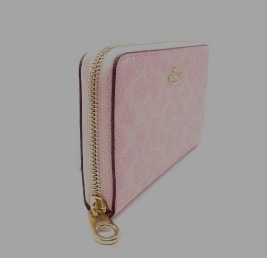 COACH コーチシグネチャー ファスナーリストウォレット長財布/パウダーピンク