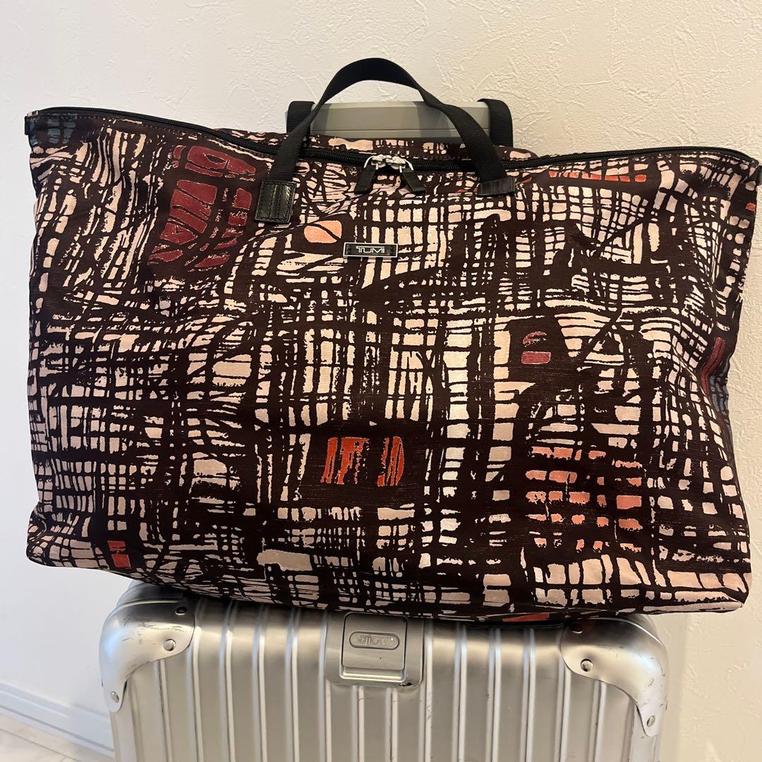used・TUMI折畳みボストンバッグ・背にループ付き