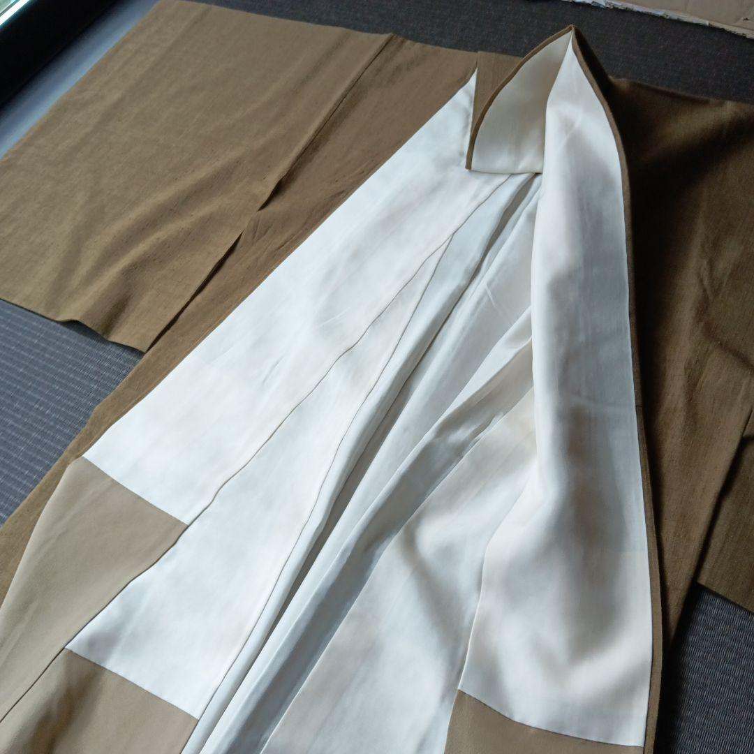 結城紬（との事で購入しております）色無地　紬　鶯茶色　梅幸茶　刺繍一つ紋入り