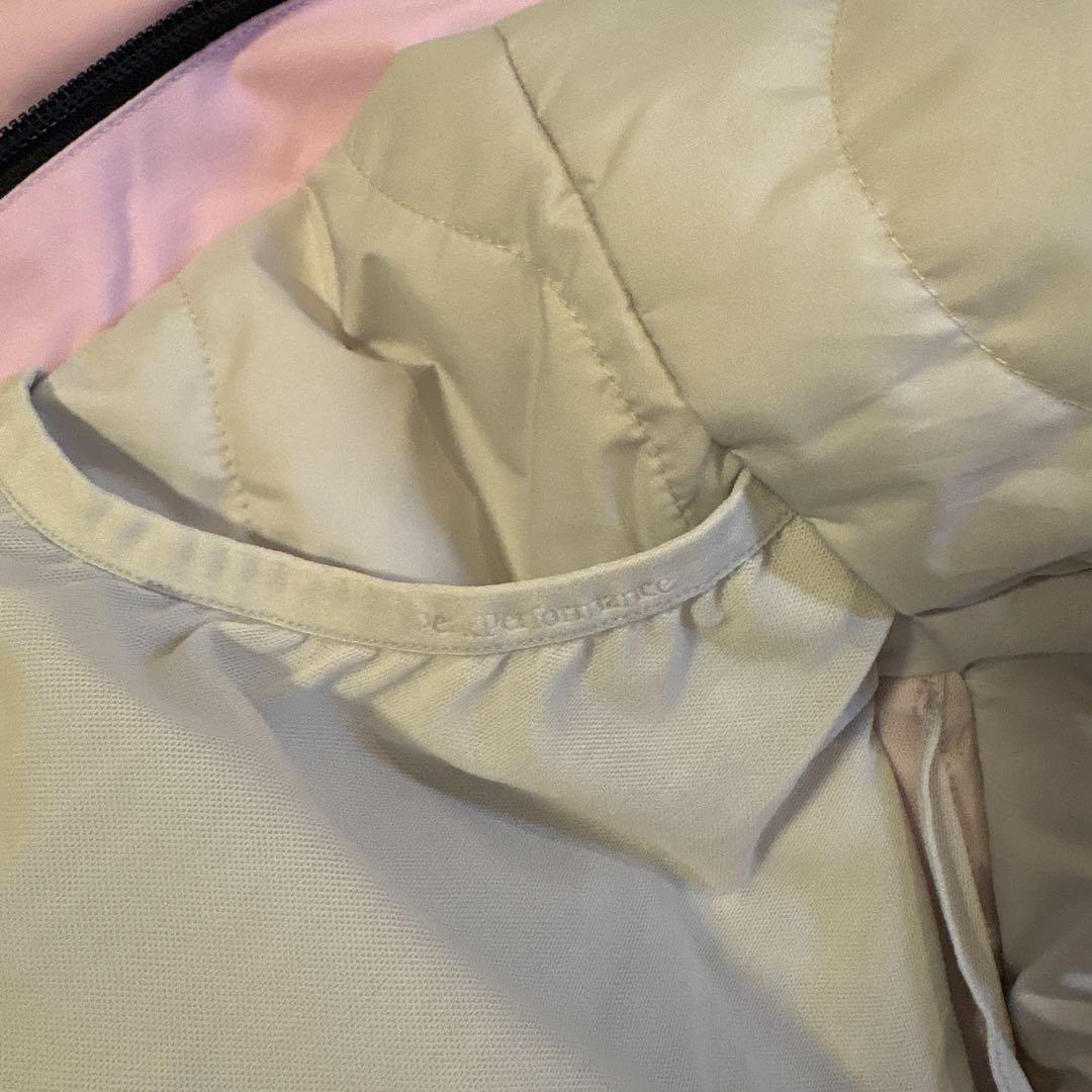 美品Peak Performance 薄ピンクフード付きスキーウェア