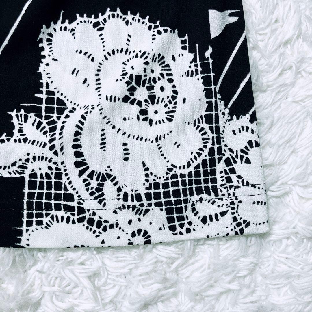 美品✨レオナール トップス カットソー カンカン トリム 花 ポピー 黒 白