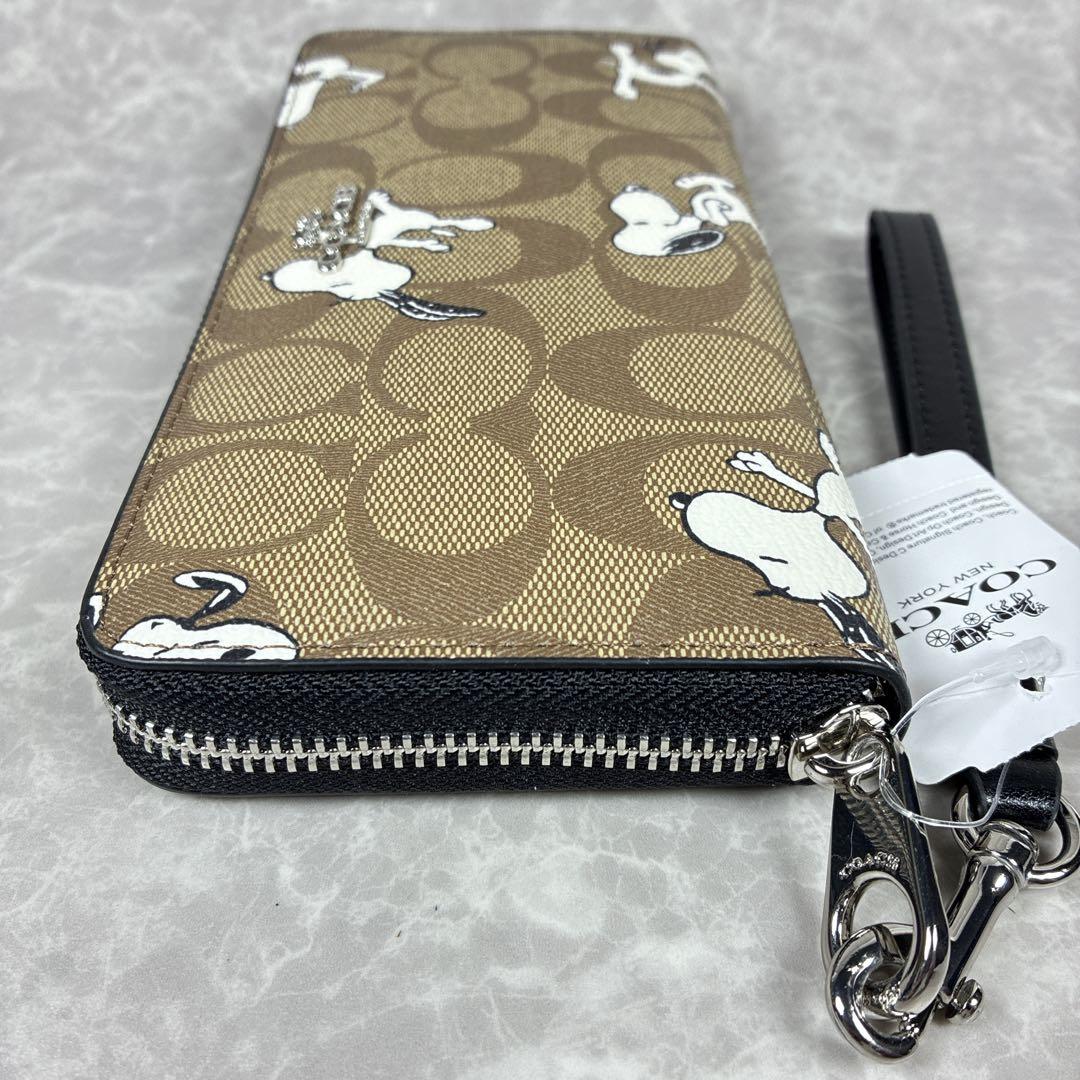 【未使用級】COACH×スヌーピー コラボ長財布 シグネチャー 保管袋付き
