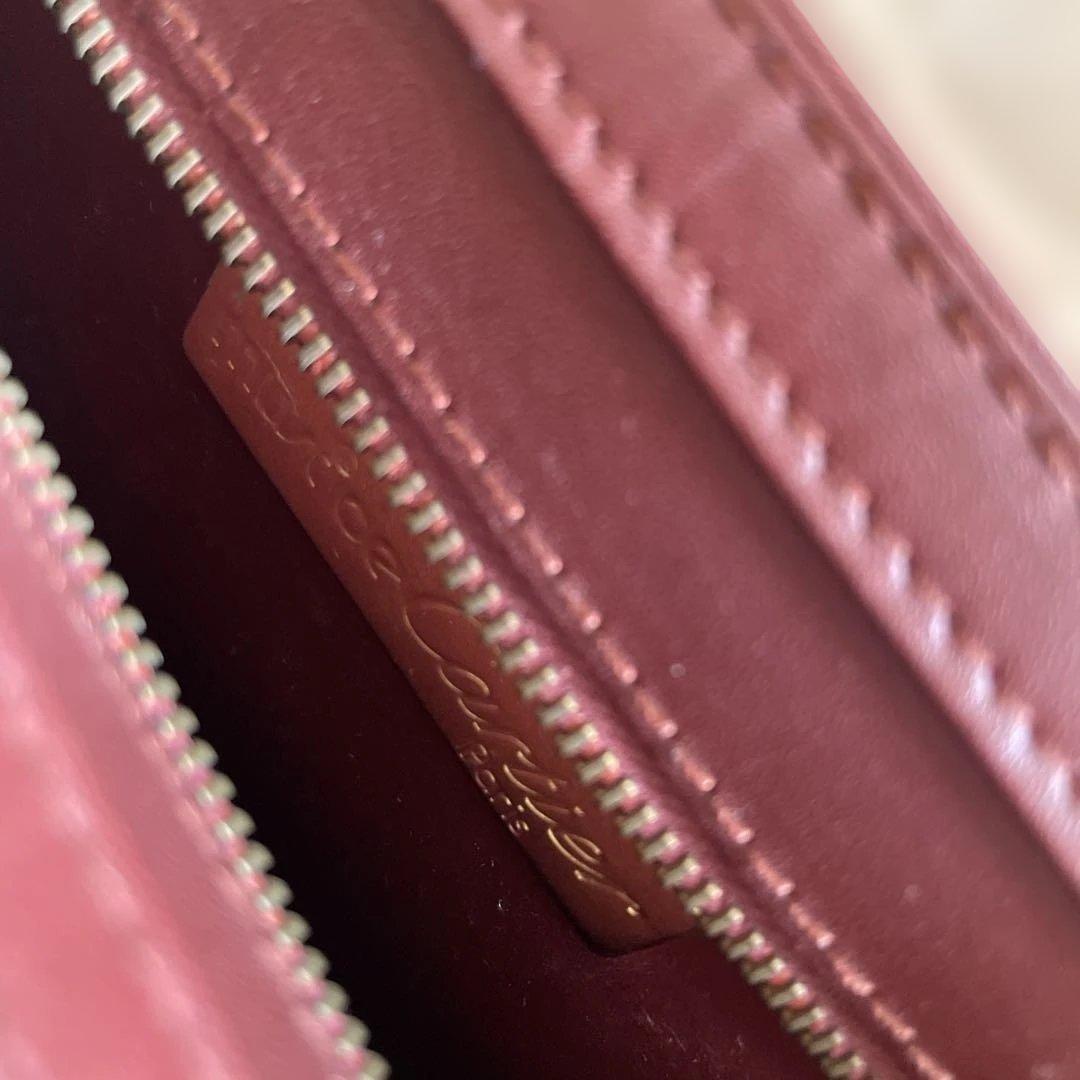 未使用　極美品　カルティエCartier ハンドバッグ　クラッチバッグ　エンジ色