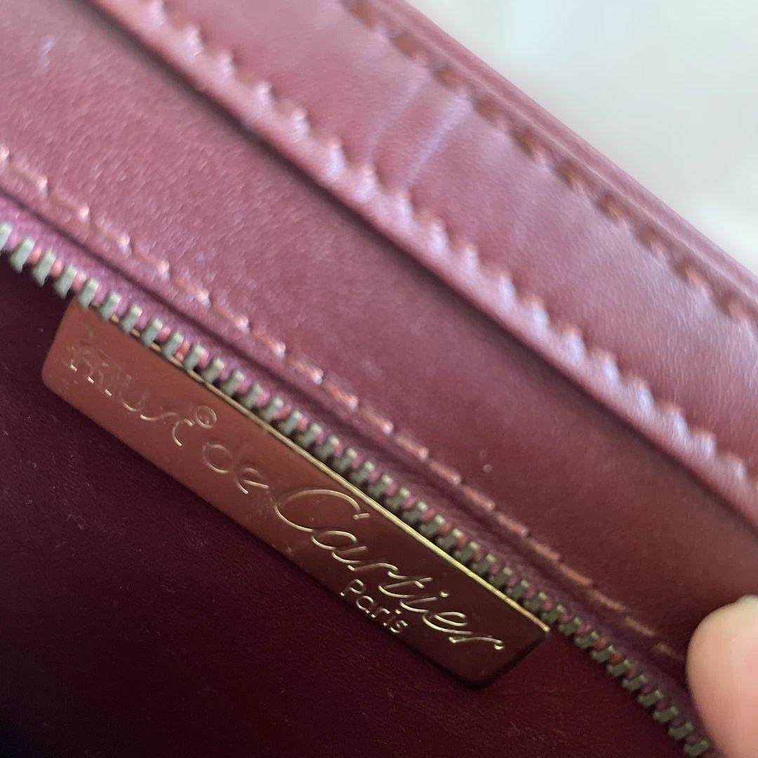 未使用　極美品　カルティエCartier ハンドバッグ　クラッチバッグ　エンジ色