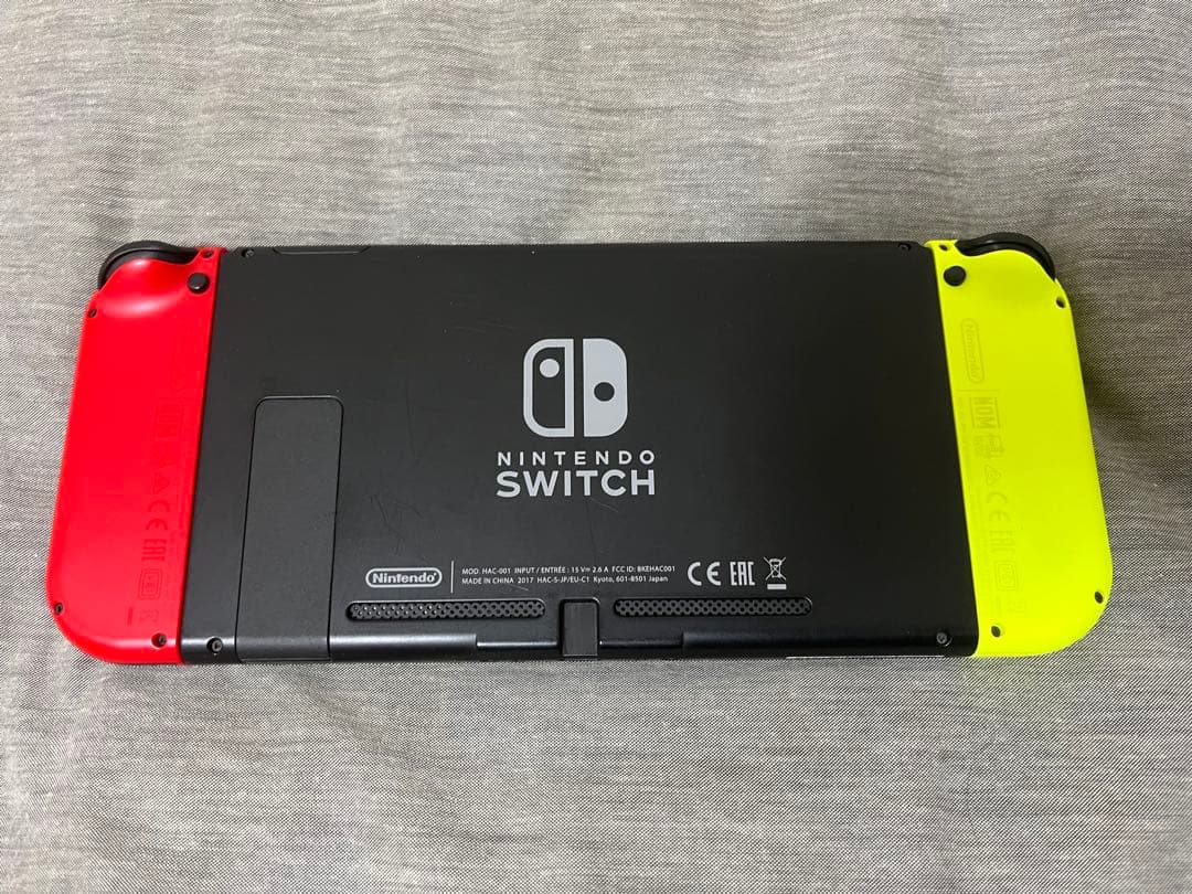 Nintendo Switch 赤/黄 本体 ハードケース付きジャンク品