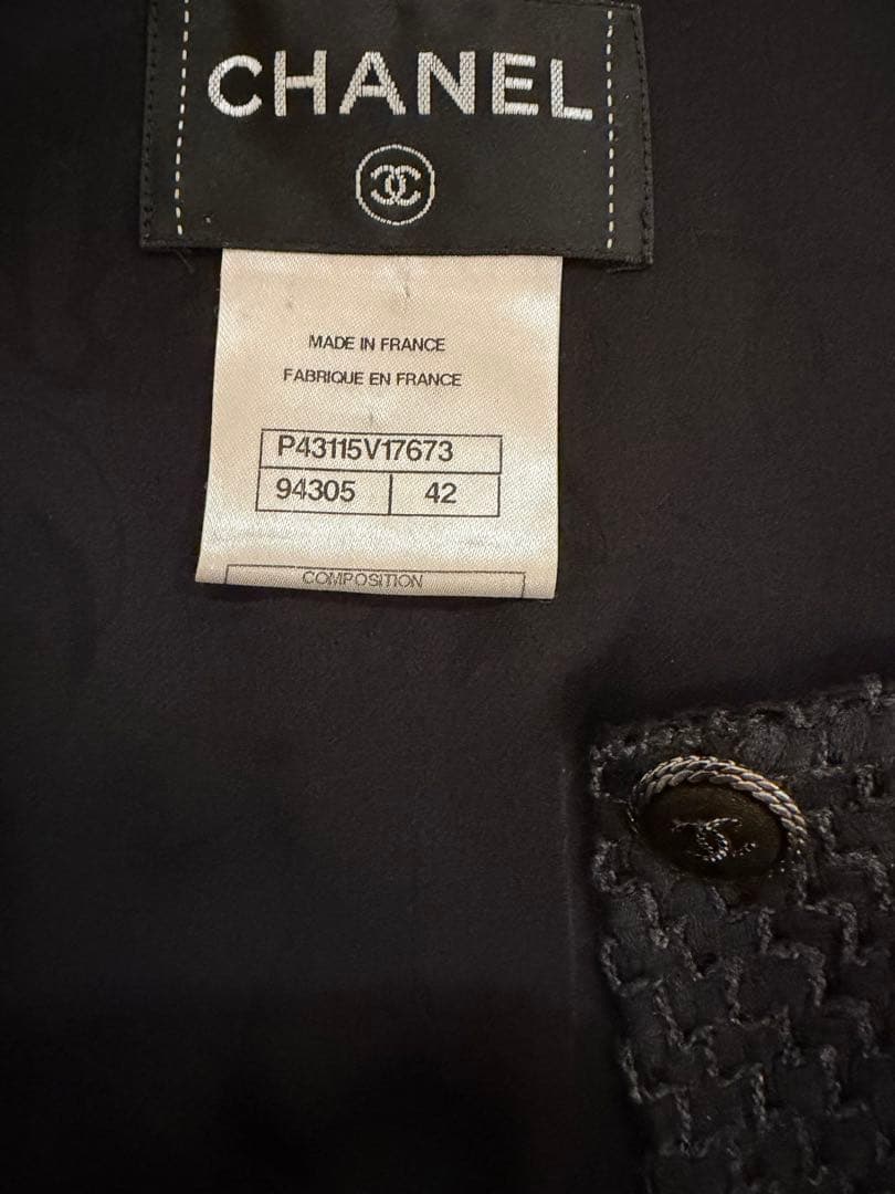 シャネルシャネル黒フリルワンピースサイズ42ツイード素材