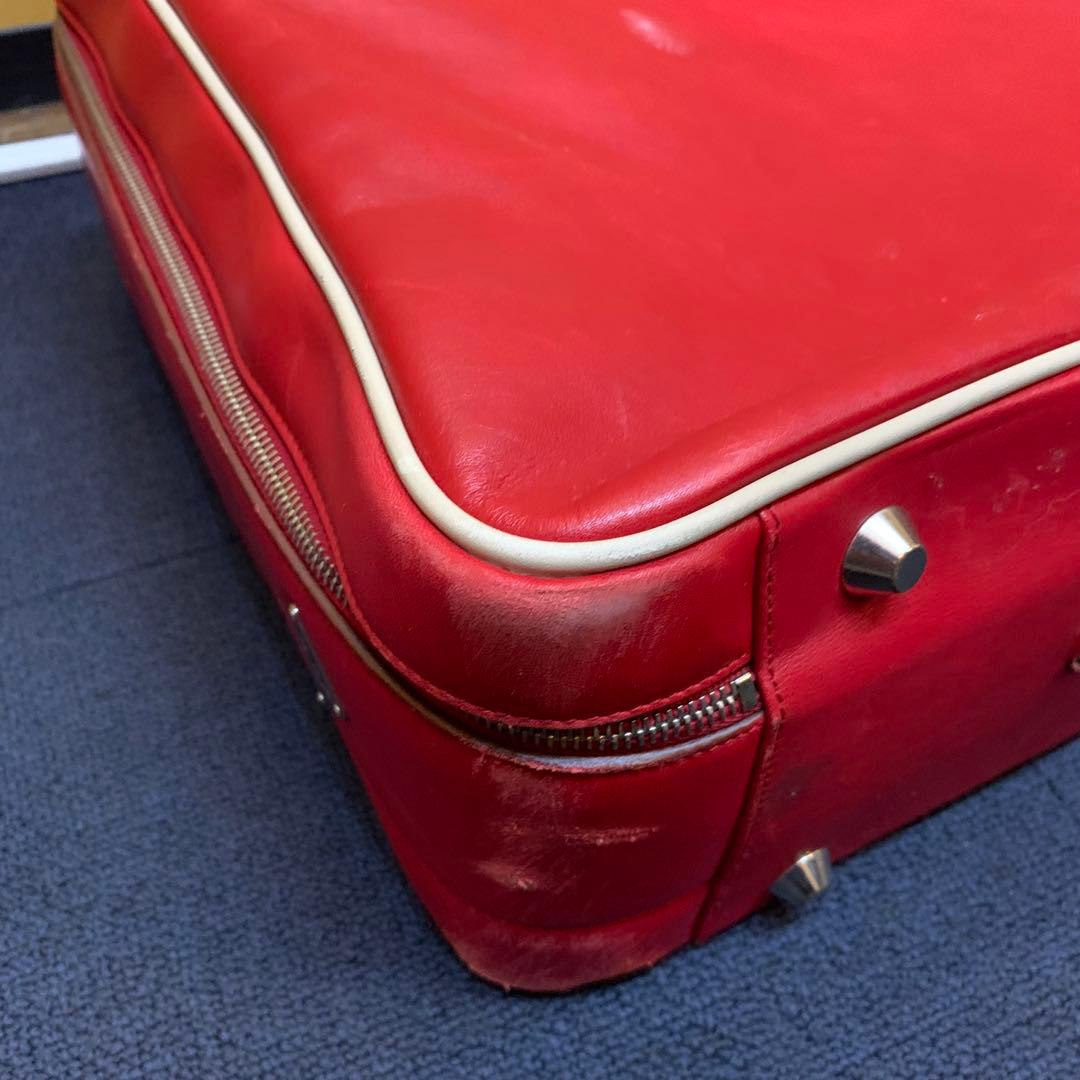 プラダ　PRADA トラベルバッグ　旅行用　スーツケース　赤　レッド　プレート