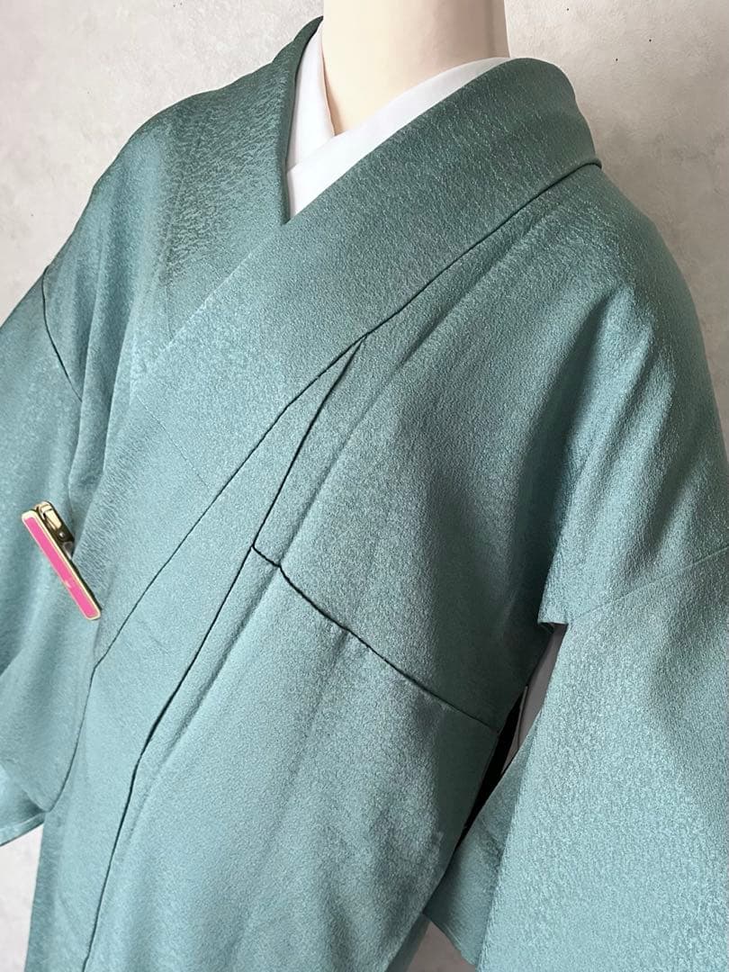 a09【在庫処分・特価】未使用 青緑 織柄 正絹 色無地 裄 64.5