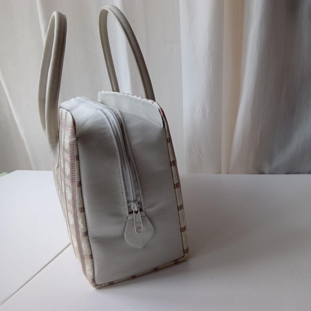 西陣織利休バック　ベージュとレッドの格子柄和装用バッグ