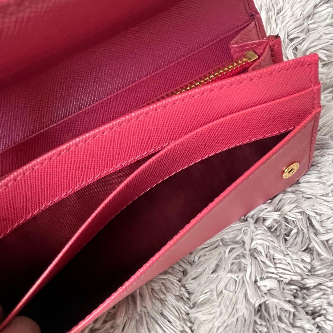 良品✨PRADA フィオッコ　サフィアーノ　メタルロゴ　リボン　ピンク　長財布