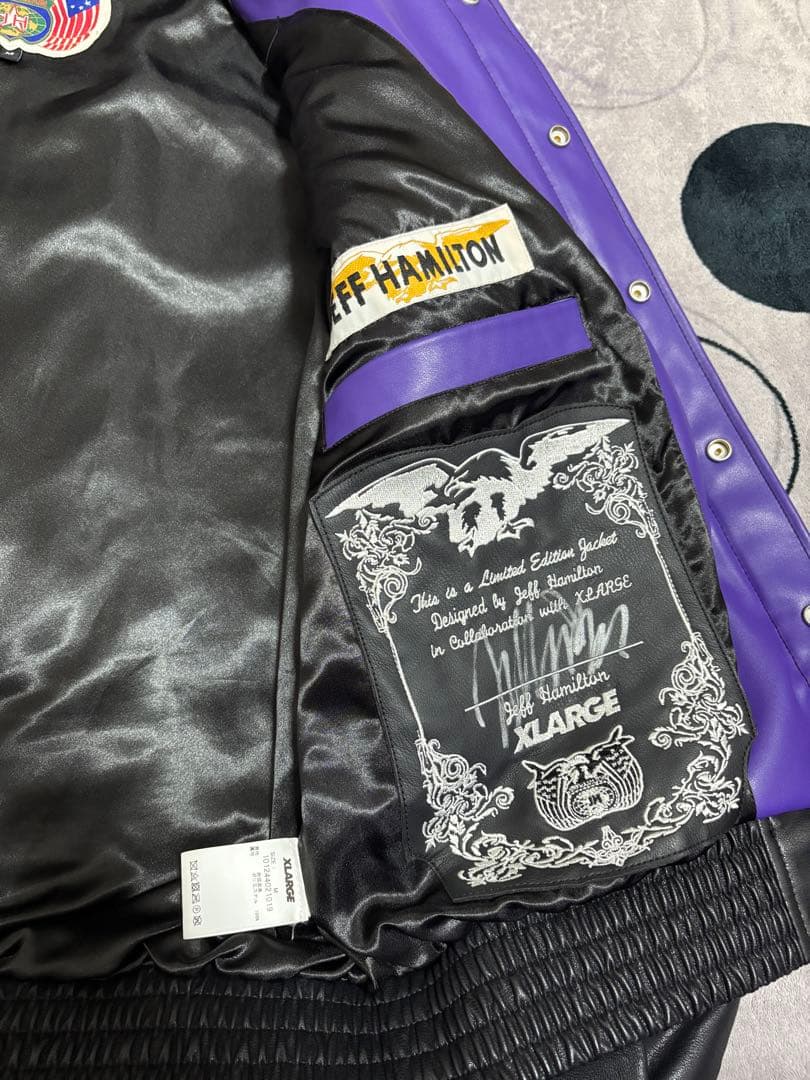 新品！！XLARGE JEFF HAMILTONスタジャン 紫 黒 M