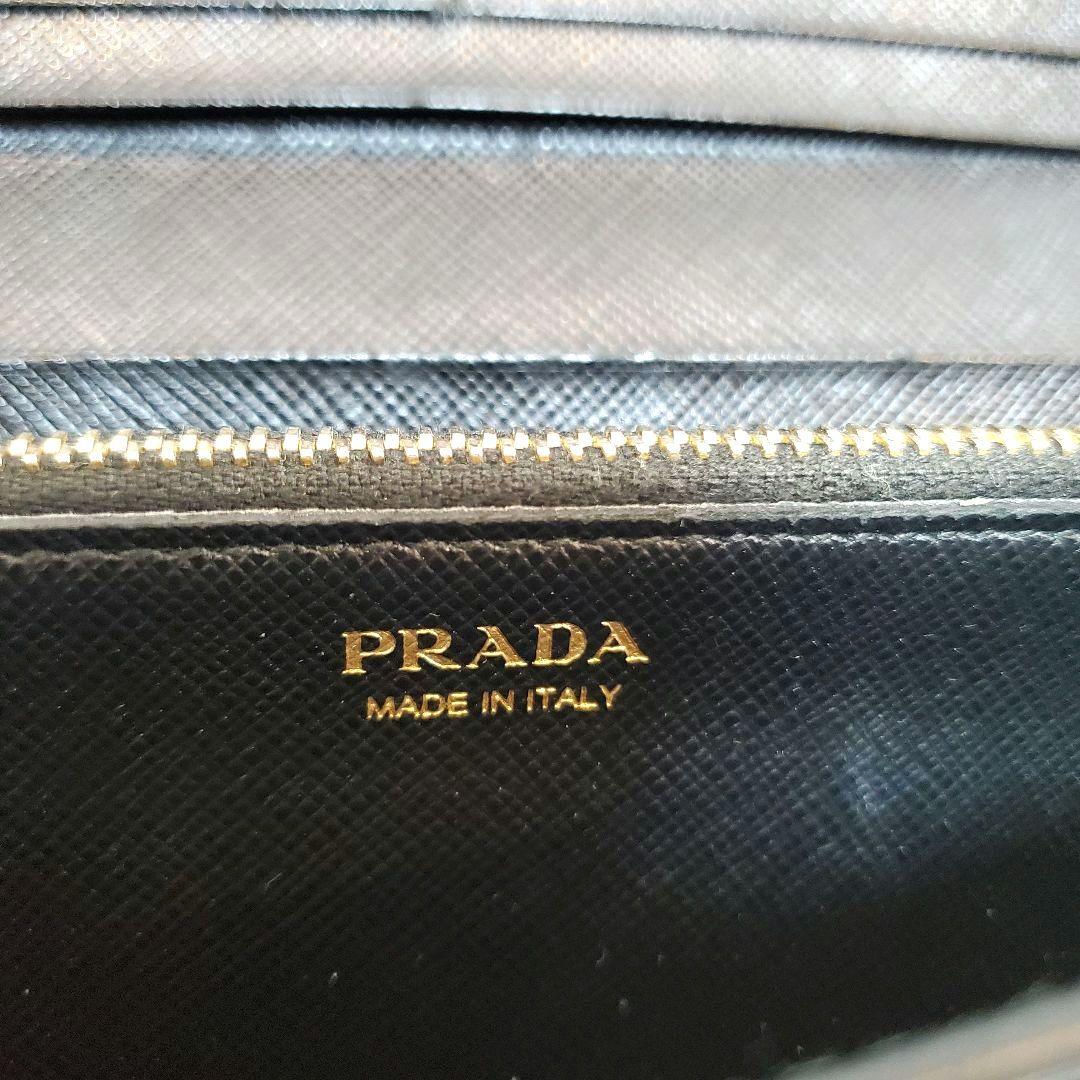 美品 プラダ　長財布 サフィアーノ フィオッコ ライト黒 メタルロゴ リボン
